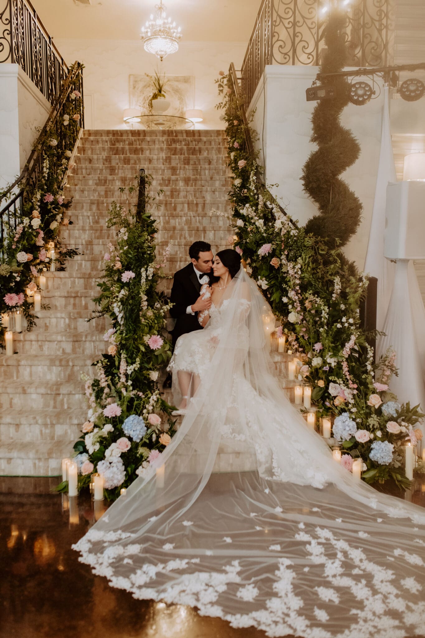 Amore Ballroom wedding venue staircase filled with flowers at avanti mansion