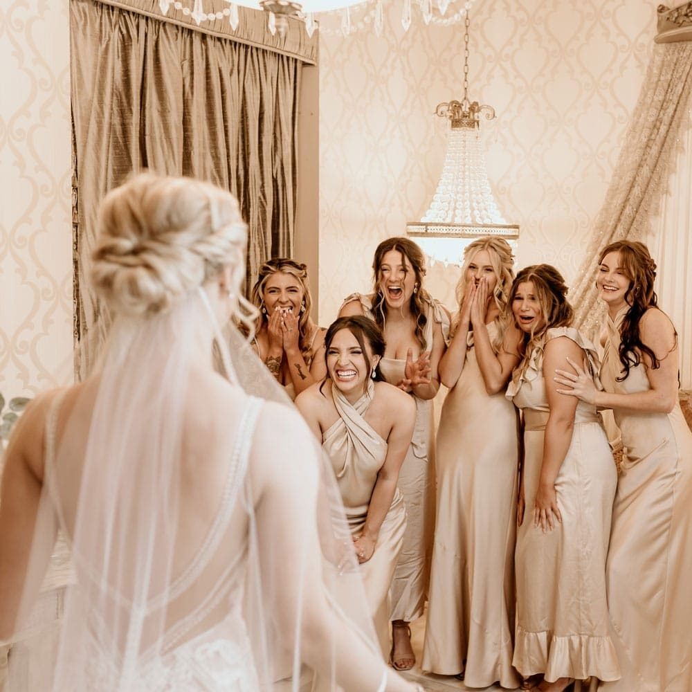 bride with bridesmaids at a reception venue in Buffalo, NY
